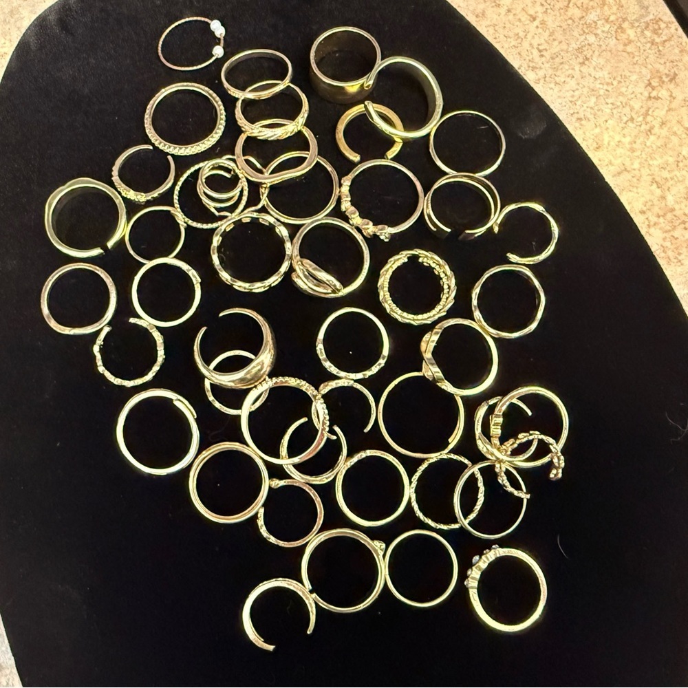 Huge lot of 48 gold tone rings